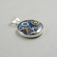 Silver pendant round with a composition of watch parts on a blue background watches art handmade original elegant exceptional unique luxury exclusive jewelry 2.JPG