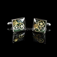 Silver square cufflinks with a composition of watch parts on a green background watches art handmade original elegant exceptional unique luxury exclusive jewelry 3.JPG