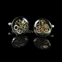 Silver round cufflinks with a composition of watch parts on a green background watches art handmade original elegant unique unique luxury exclusive jewelry 3.JPG