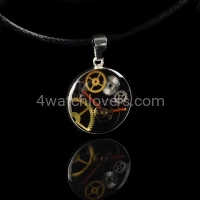 Silver round pendant with a composition of watch parts on a black background watches handmade art original elegant exceptional unique luxury exclusive jewelry 5.JPG
