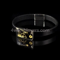 Silver bracelet with a composition of watch parts on a black background, art watches, handmade, original, elegant, unique, exclusive jewelry 3.JPG