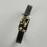 Silver bracelet with a composition of watch parts on a black background, art watches, handmade, original, elegant, unique, exclusive jewelry 5.JPG